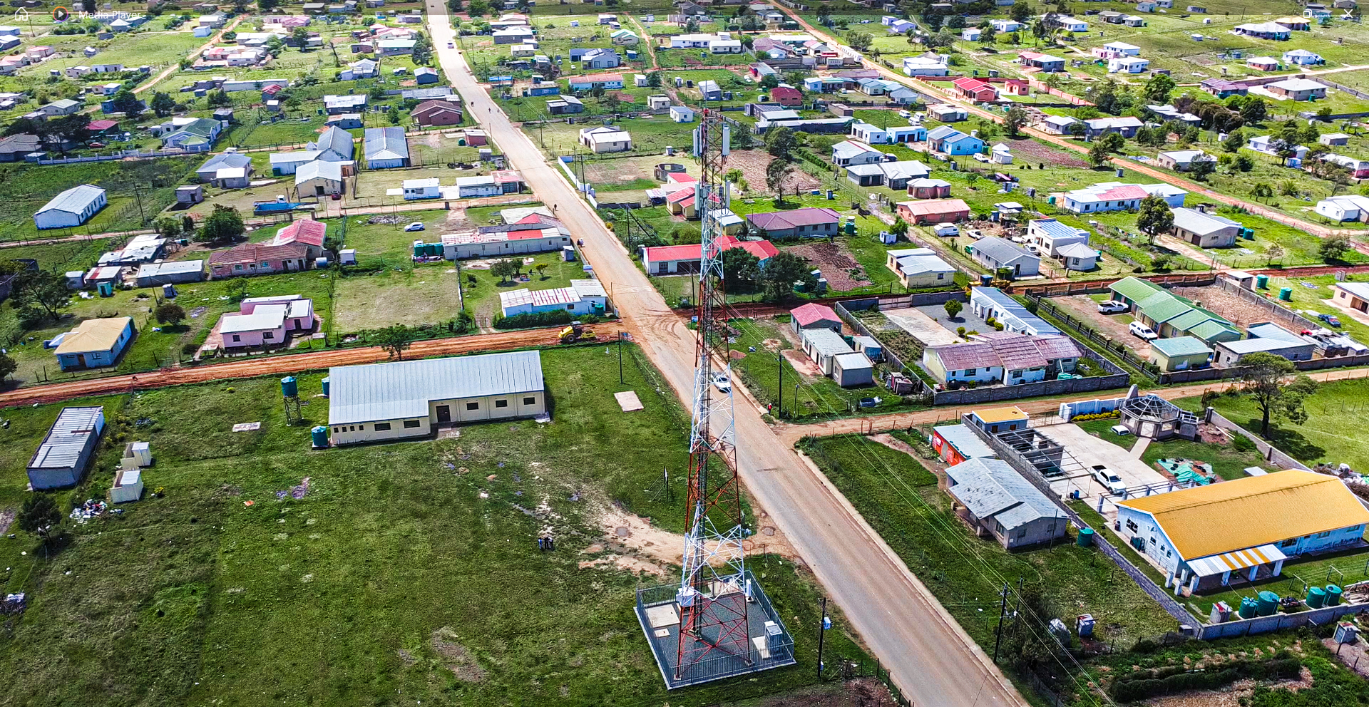 Aerial view of a telecommunications tower in a rural South African community